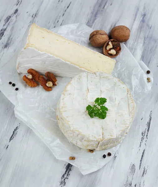 Tasty Italian cheese on wooden table — Stock Photo, Image