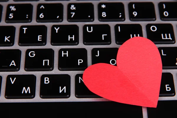 Red heart on computer keyboard close up Royalty Free Stock Photos