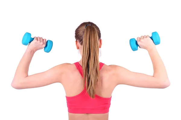Young beautiful fitness girl exercising with dumbbells, close-up, isolated on white — Stock Photo, Image