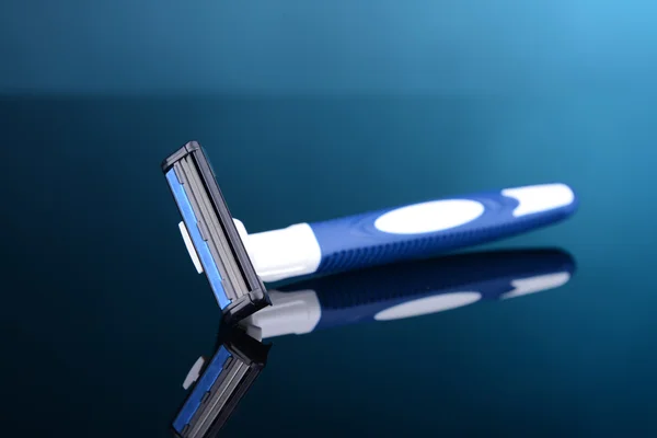 Men  shaver on blue background — Stock Photo, Image