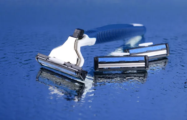 Men  shaver on blue background — Stock Photo, Image