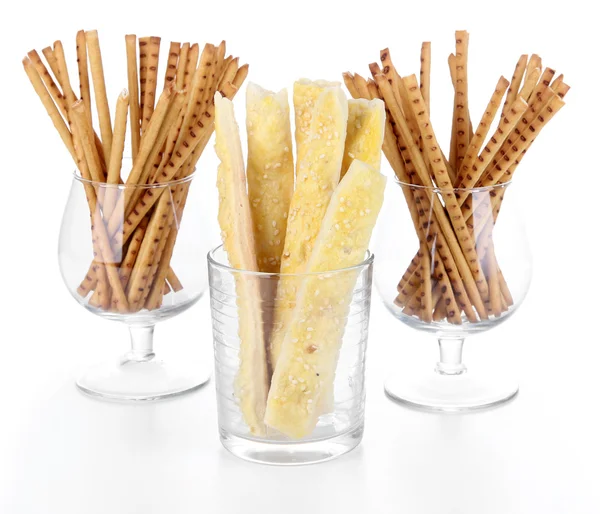 Bread sticks in glasses isolated on white — Stock Photo, Image