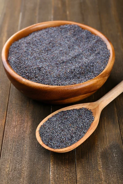 Poppy seeds on table close-up — Stock Photo, Image