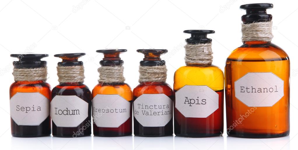 Historic old pharmacy bottles with label  isolated on white