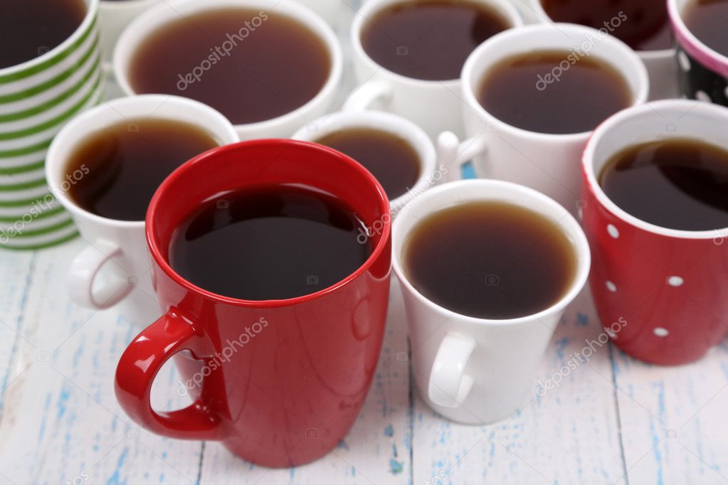 depositphotos_42761433-stock-photo-many-cups-of-tea-on.jpg