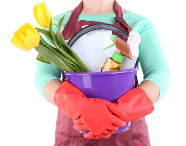 Housewife holding bucket with cleaning equipment. Conceptual photo of spring cleaning. Isolated on white — Stock Photo, Image