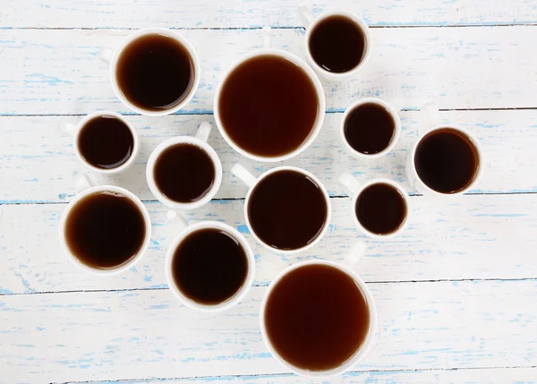 Many cups of tea on table close-up — Stock Photo, Image