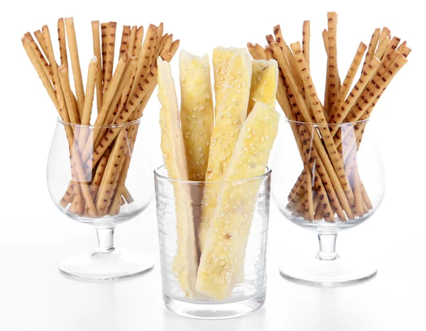 Bread sticks in glasses isolated on white — Stock Photo, Image