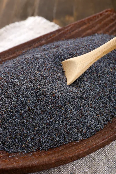 Poppy seeds in bowl on table close-up — Stock Photo, Image