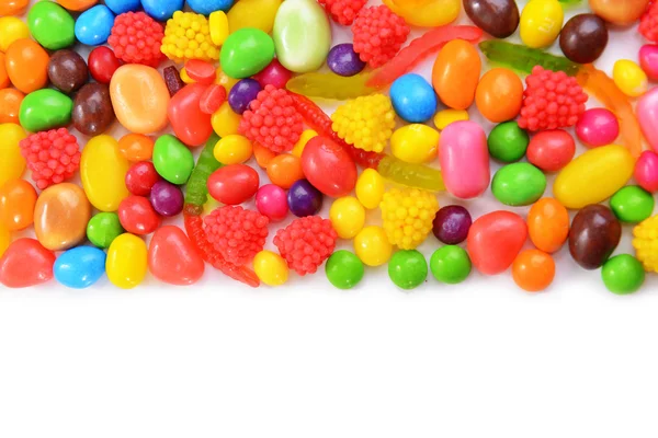 Olika färgstarka frukt godis närbild — Stockfoto