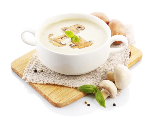 Mushroom soup in white bowl, on napkin, isolated on white — Stock Photo, Image