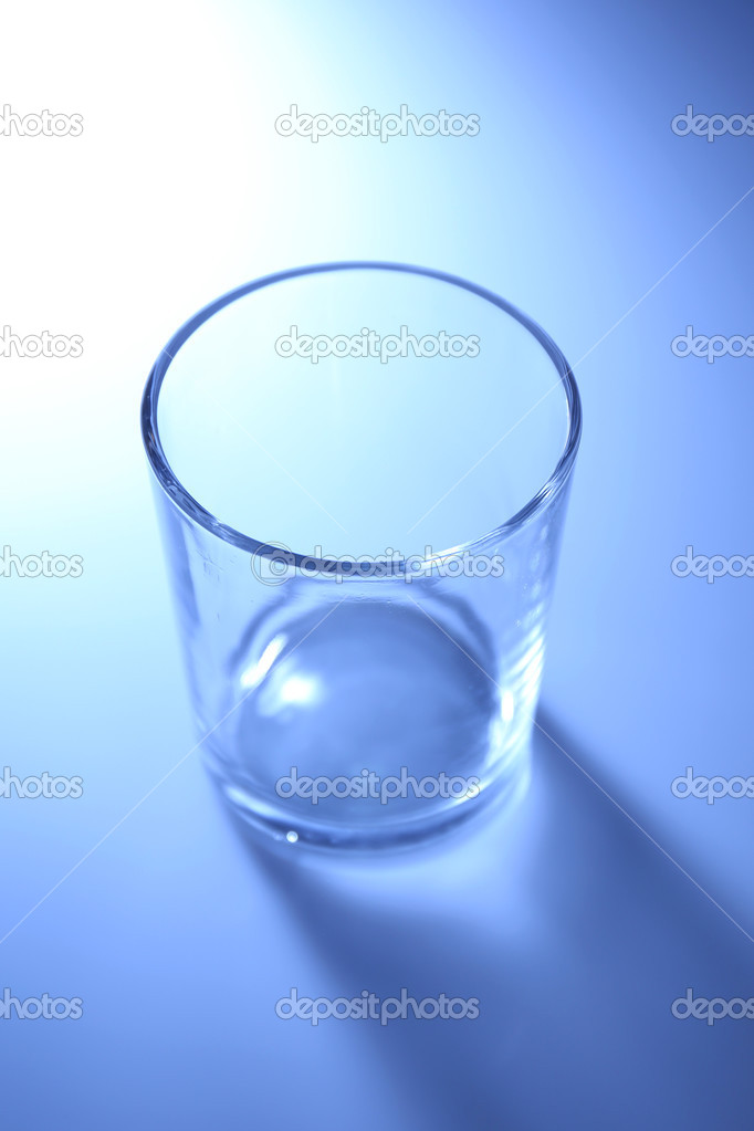 Empty glass, on  blue background