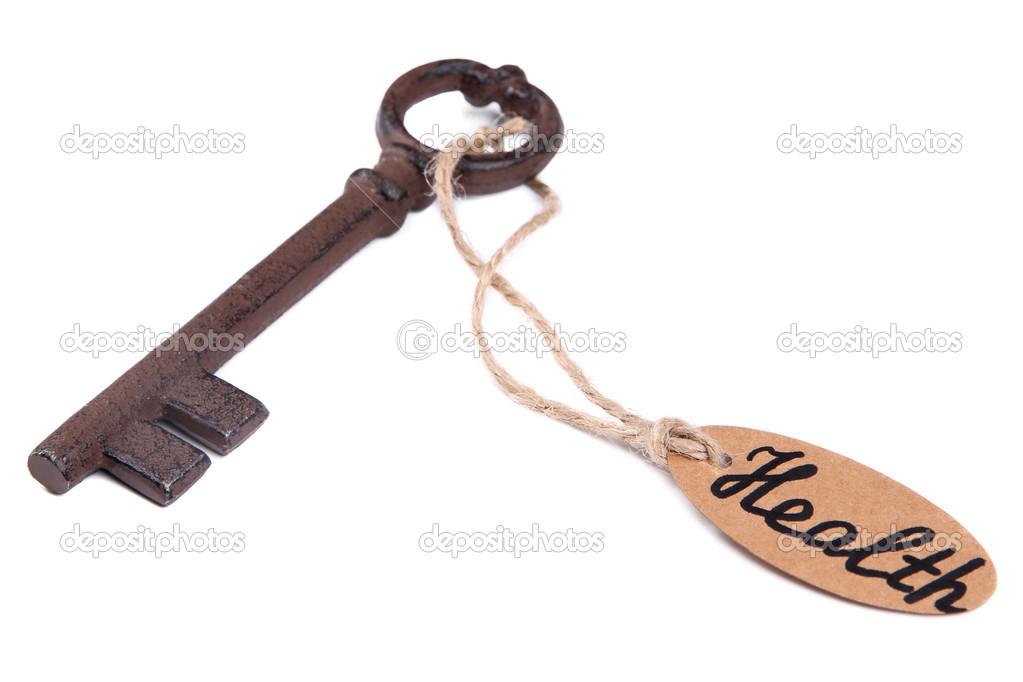 Key to health, Conceptual photo. Isolated on white
