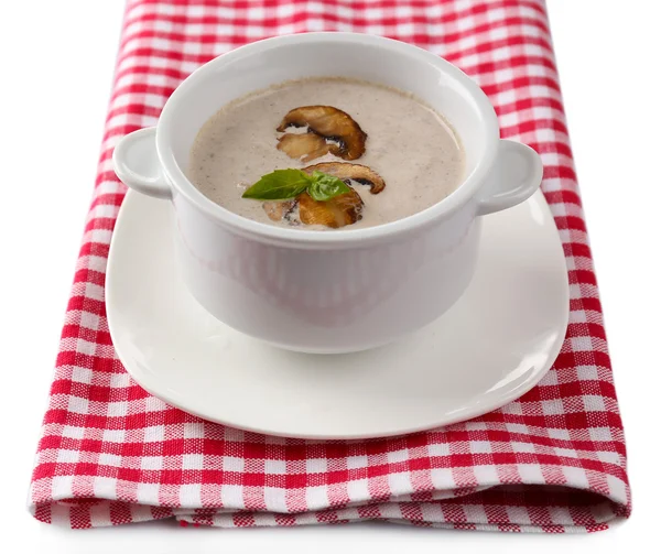 Mushroom soup in white pot, on napkin, isolated on white — Stock Photo, Image