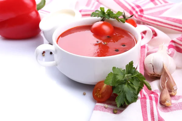 Tasty tomato soup and vegetables, isolated on white — Stock Photo, Image