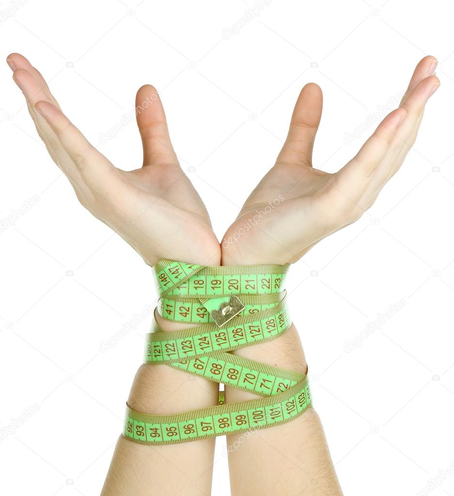 Woman hands with measuring tape isolated on white