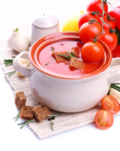 Tasty tomato soup and vegetables, isolated on white — Stock Photo, Image