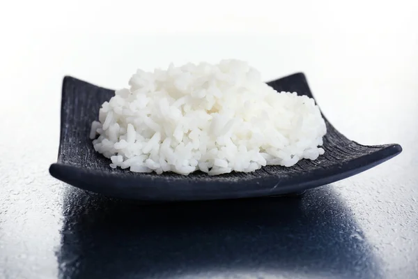 Cooked rice on grey background — Stock Photo, Image