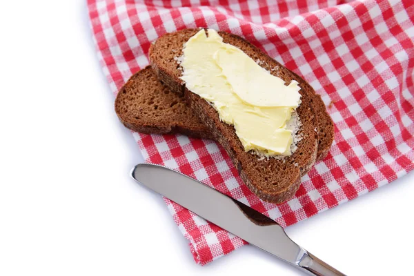 Rebanada de pan de centeno con mantequilla, aislado en blanco —  Fotos de Stock