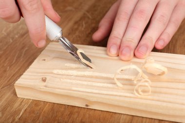 Wood carving tools close up clipart