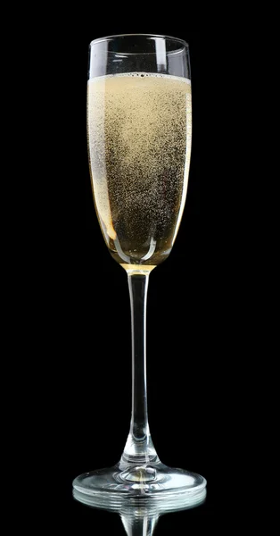 Sklenka šampaňského, na černém pozadí — Stock fotografie