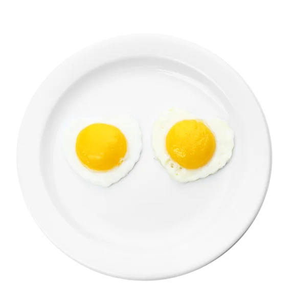Renkli peçete üzerinde plaka üzerinde ekmek ile pişmiş yumurta — Stok fotoğraf