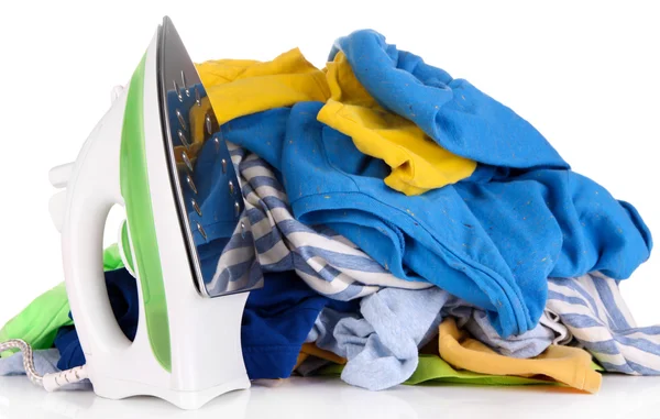 Plancha y pila de ropa colorida aislada en blanco —  Fotos de Stock