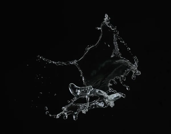 Spruzzi d'acqua su sfondo nero — Foto Stock