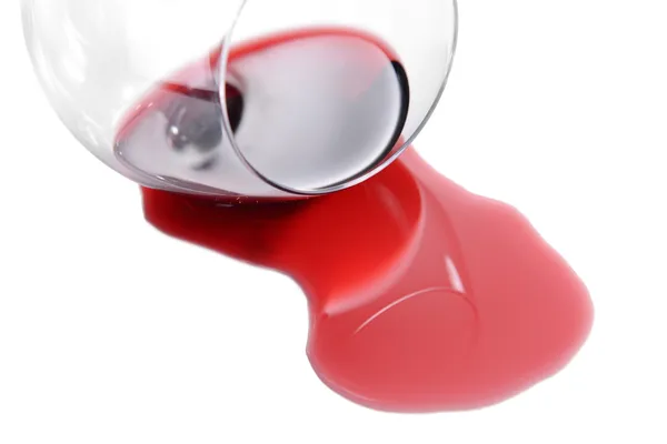 Overturned glass of wine isolated on white — Stock Photo, Image