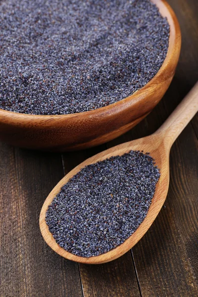 Poppy seeds on table close-up — Stock Photo, Image