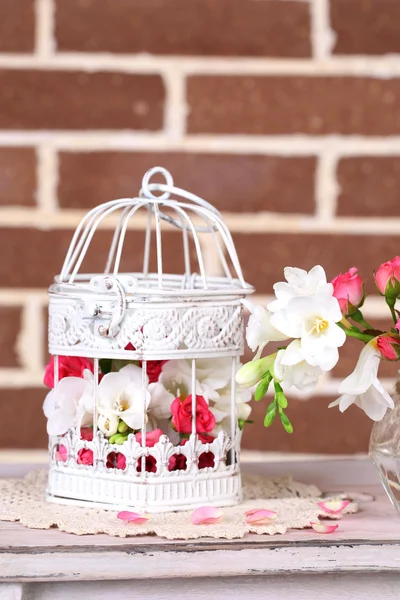 Beautiful still life with small pink roses and freesia flowers — Stock Photo, Image