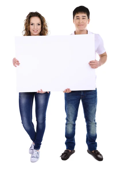 Two beautiful young people holding blank poster isolated on white — Stock Photo, Image