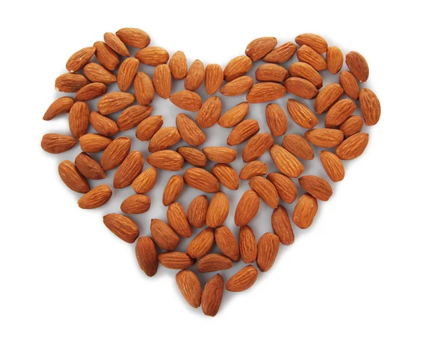 Almonds heart isolated on white — Stock Photo, Image