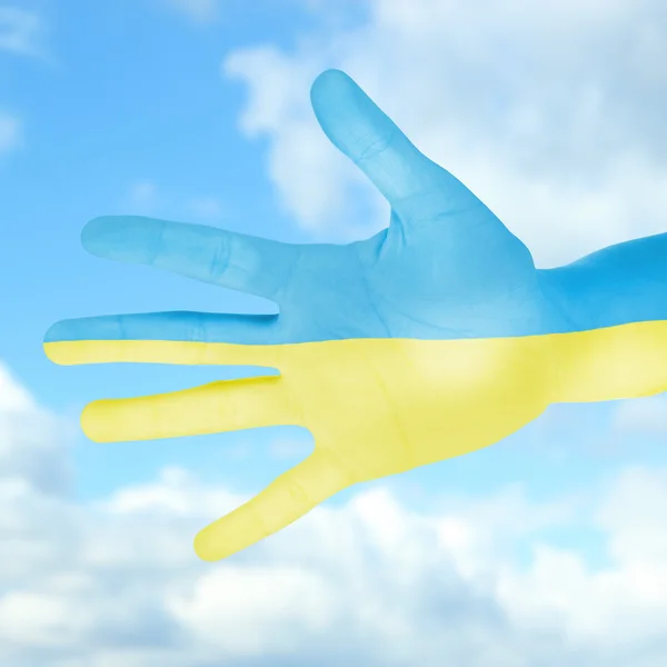 Флаг Украины нарисован на руке — стоковое фото
