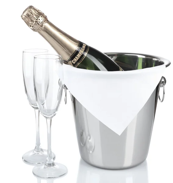 Bottle of champagne in pail and empty glasses, isolated on white — Stock Photo, Image