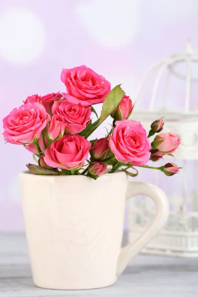 Beautiful small pink roses, on light background — Stock Photo, Image