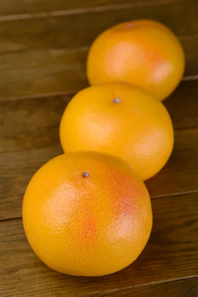 Ripe grapefruit on table close-up — Stock Photo, Image