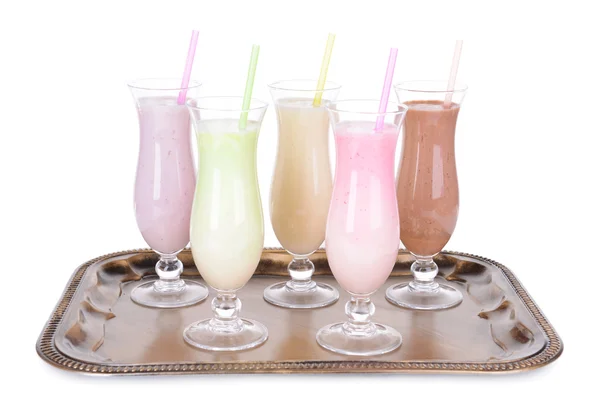 Milk shakes on tray isolated on white — Stock Photo, Image