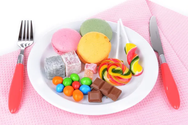 Different sweets on plate on table close-up — Stock Photo, Image