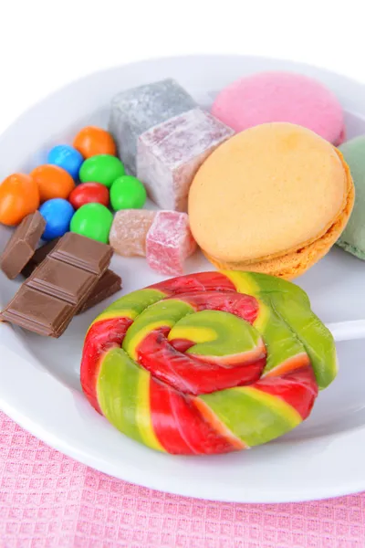 Different sweets on plate on table close-up — Stock Photo, Image