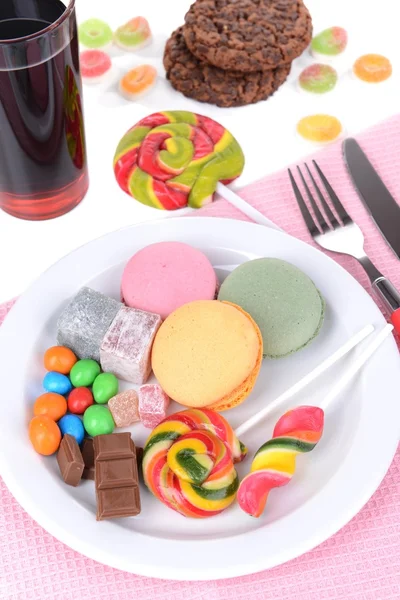 Different sweets on plate on table close-up — Stock Photo, Image