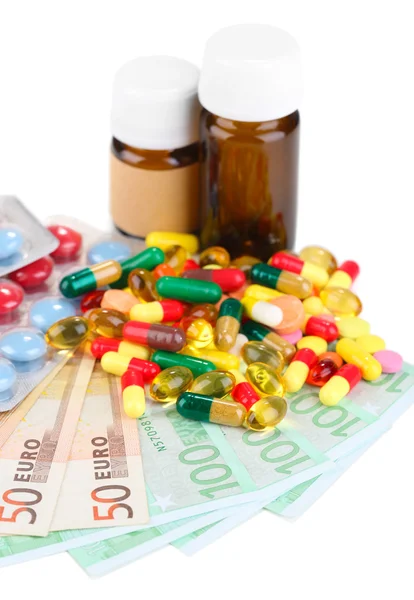 お金に処方薬の医療コストの上昇を表す背景します。白で隔離されます。 — ストック写真