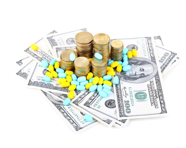 Médicaments sur ordonnance sur fond d'argent représentant la hausse des coûts des soins de santé. Isolé sur blanc — Photo