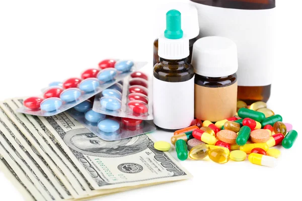 Prescription drugs on money background representing rising health care costs. Isolated on white — Stock Photo, Image