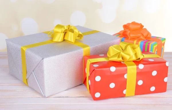 Gift boxes on table on light background — Stock Photo, Image
