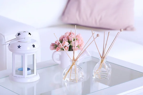 Room air refreshers and decorations on table, close-up, on home interior background — Stock Photo, Image