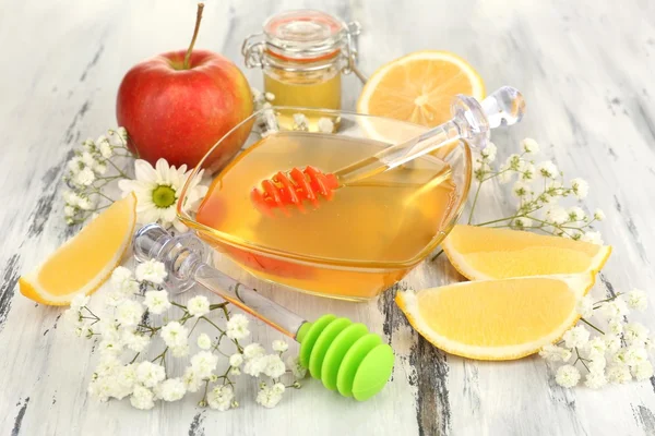 Sweet honey on wooden table — Stock Photo, Image