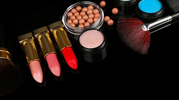 Professional make-up tools on black background — Stock Photo, Image