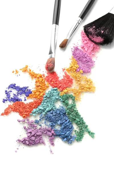 Crushed eyeshadow and professional make-up brush close up — Stock Photo, Image