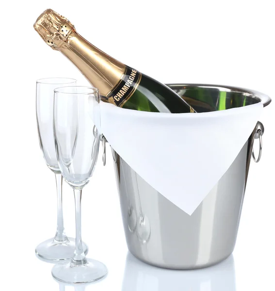 Bottle of champagne in pail and empty glasses, isolated on white — Stock Photo, Image